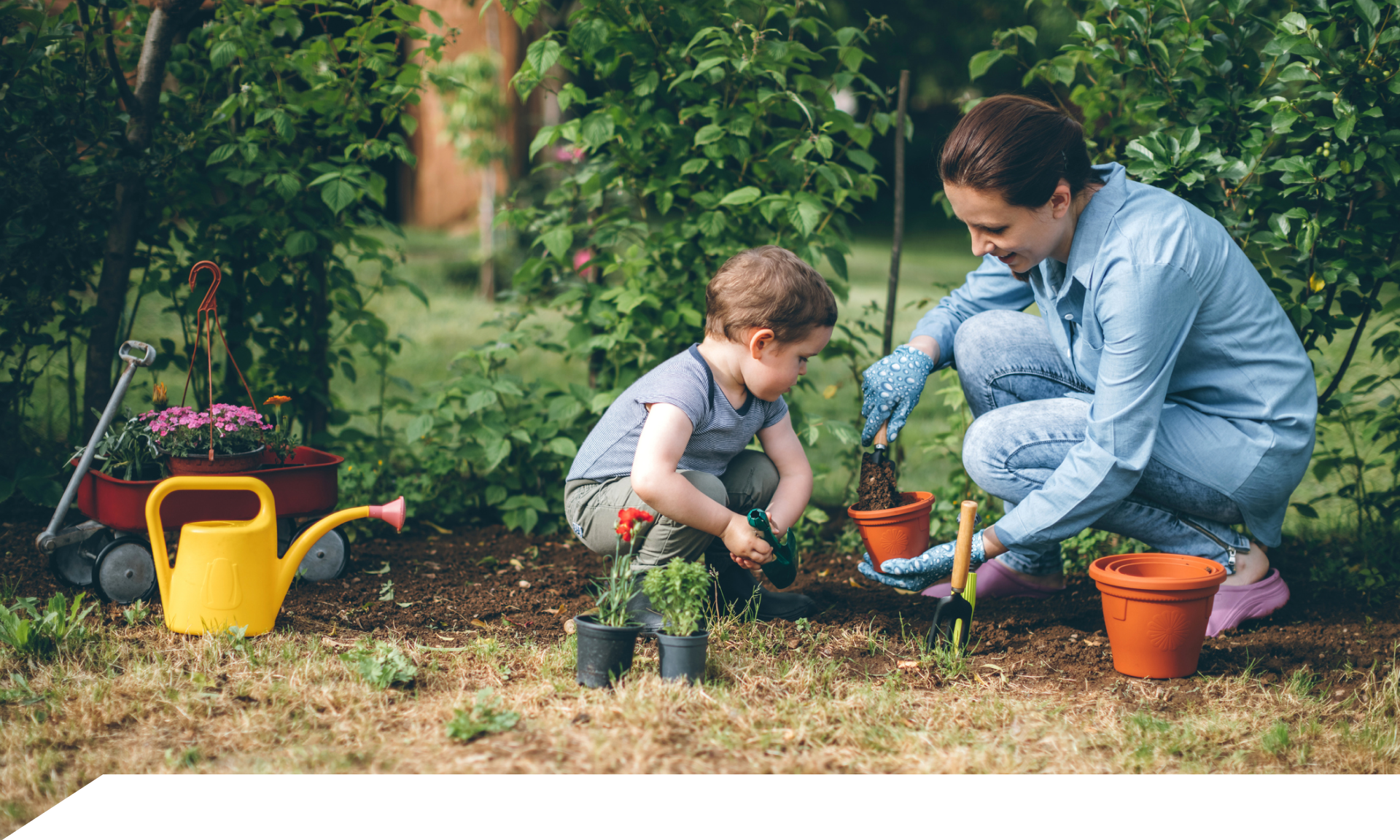 Woman gardening with her child