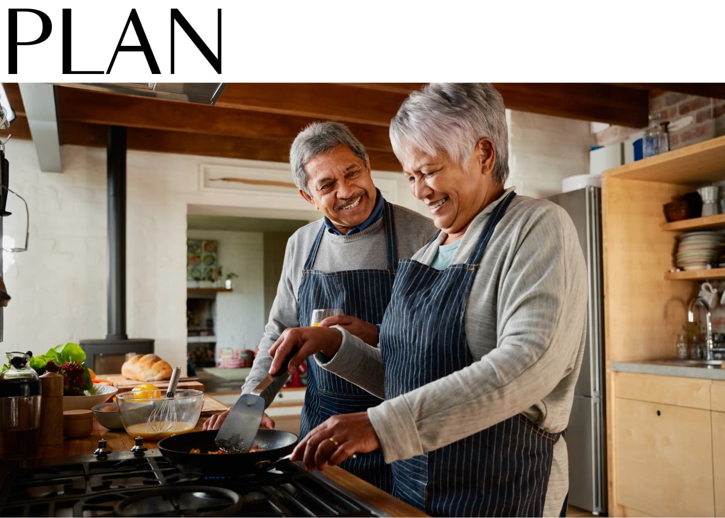 plan couple in kitchen cooking