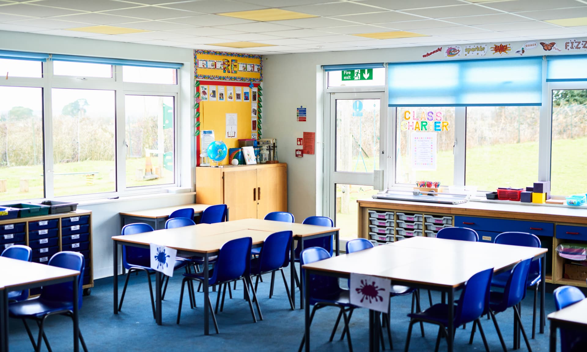 Empty primary school classroom - stock photo
