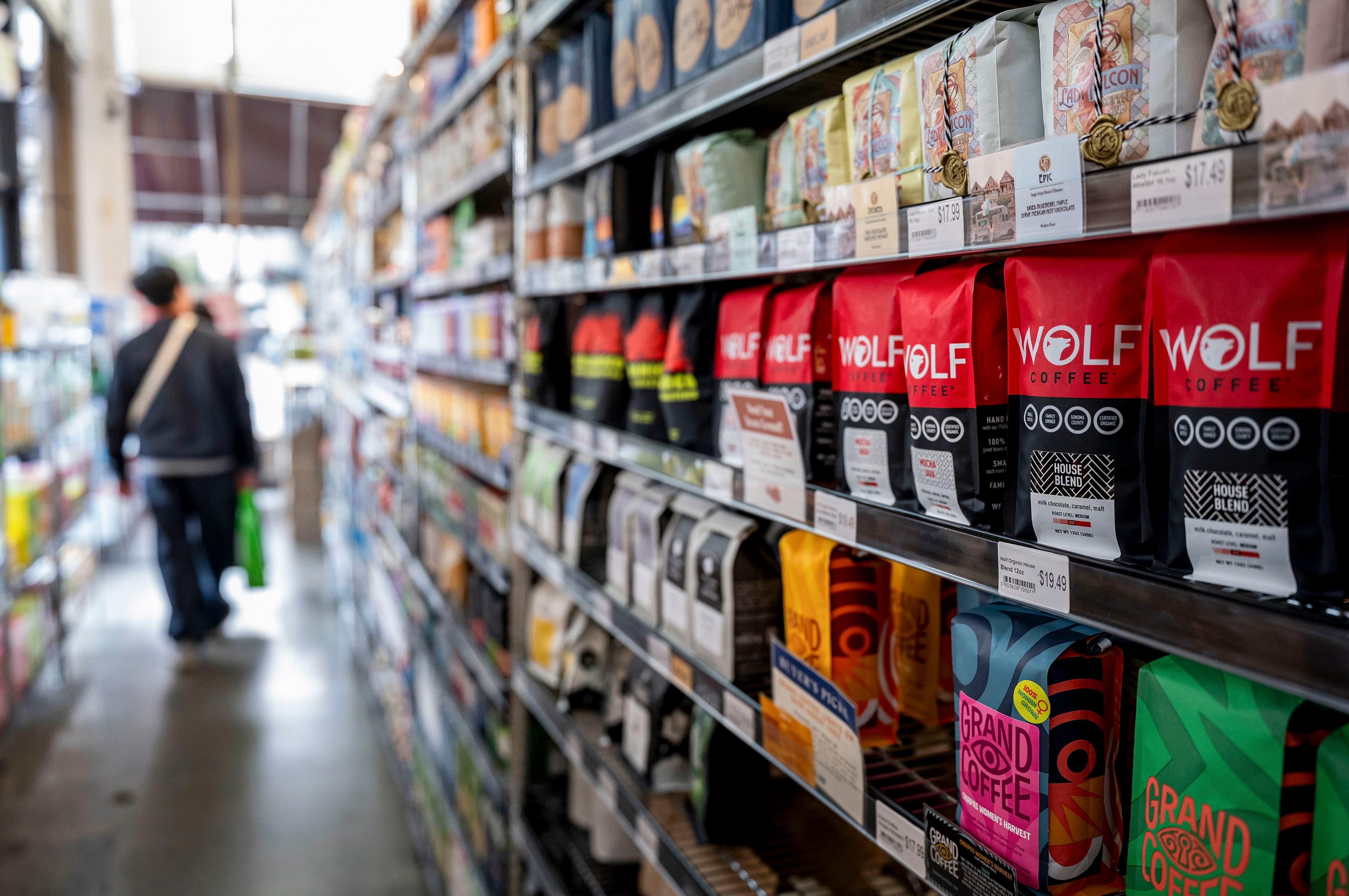 A Seine river bus boat docks in front the Eiffel Tower adorned with Olympic rings ahead of the Paris 2024 Olympic and Paralympic Games in Paris in July 16, 2024