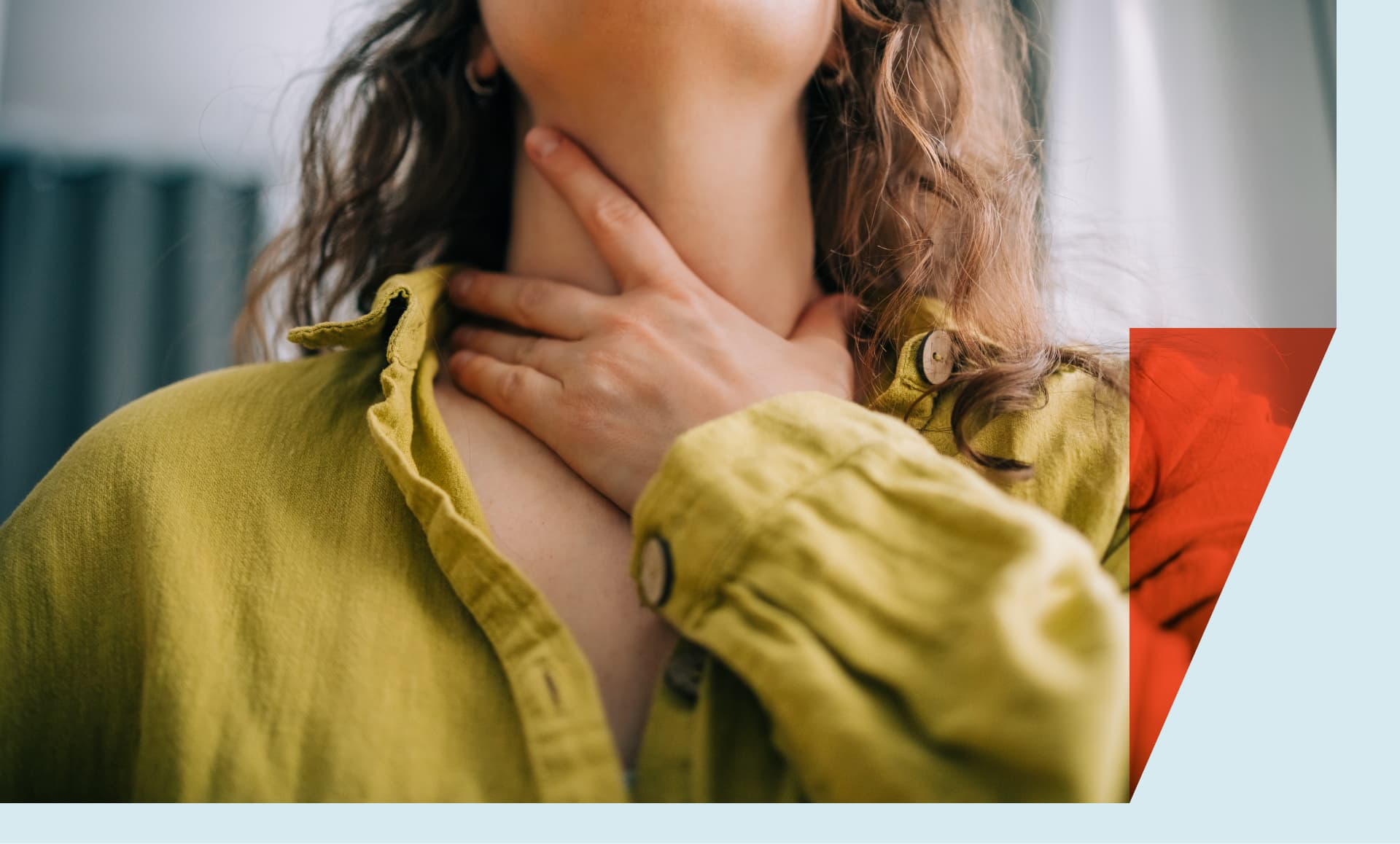 Woman touching her throat