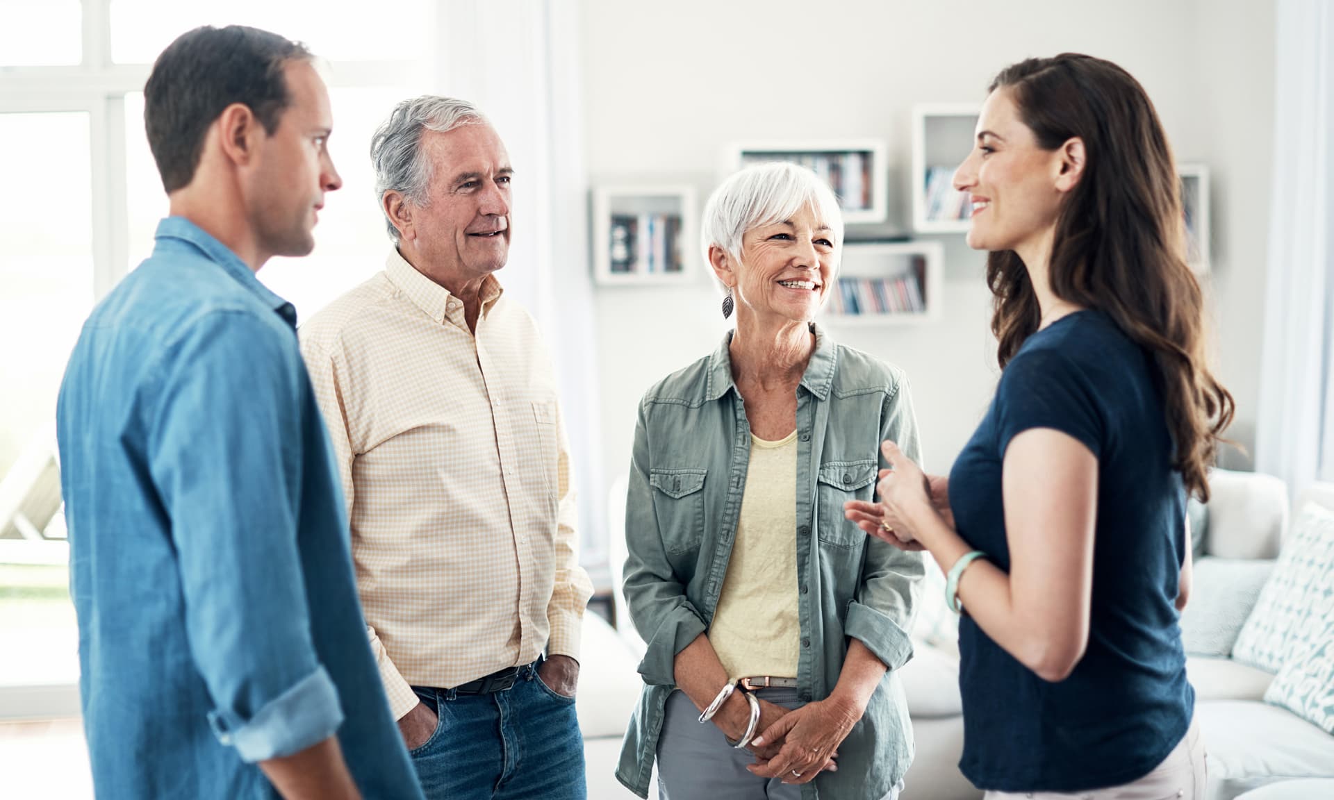 older and younger couples talking